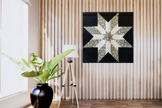 Modern lone star art quilt made of quilting cotton fabric and quilted in a grid patter.